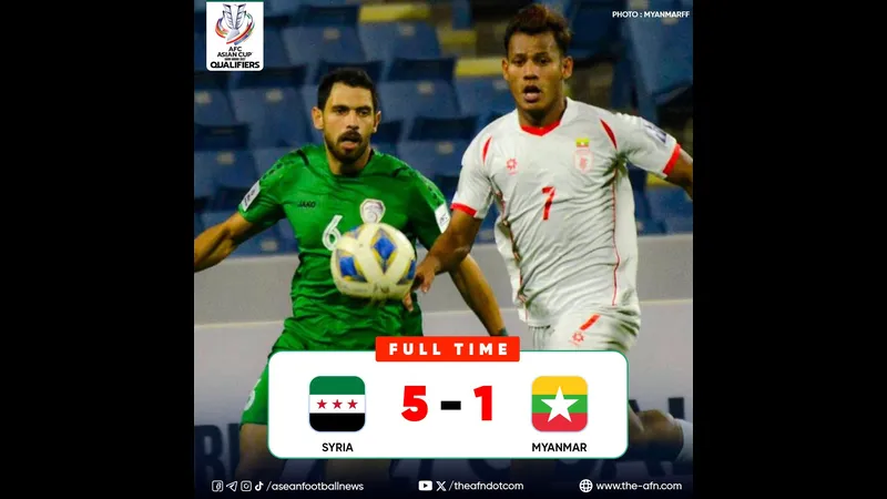 Cầu thủ Myanmar đang nỗ lực chống lại sự áp đảo của cầu thủ Syria trong trận đấu